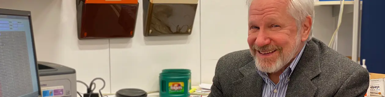 Mark Deziel at his desk